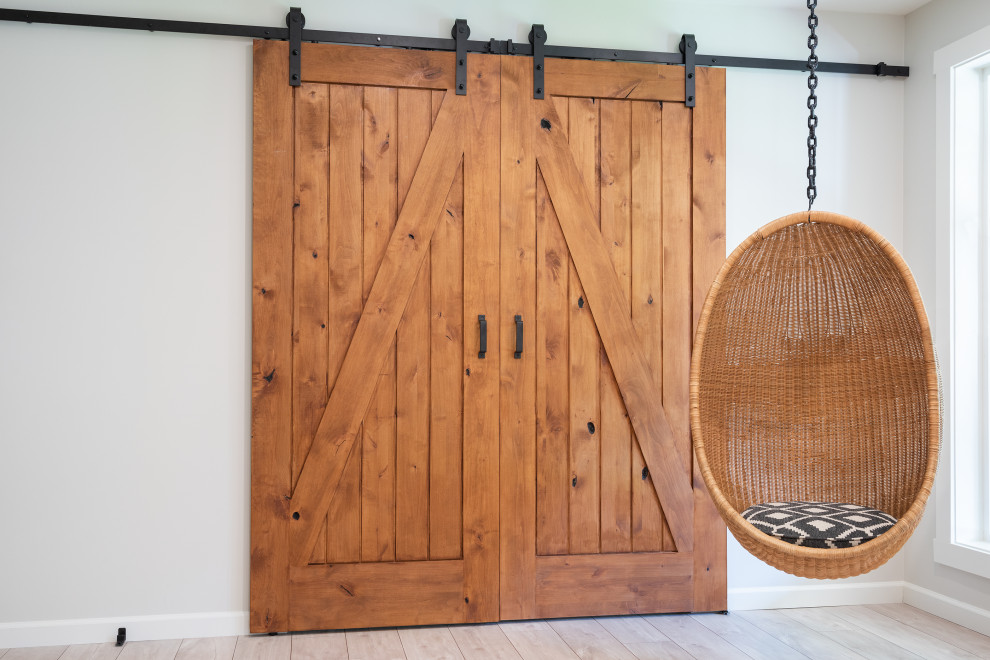 Example of a transitional home design design in Vancouver