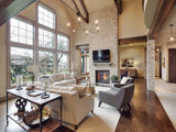 Rustic Family Room by Dwell Interiors, LLC