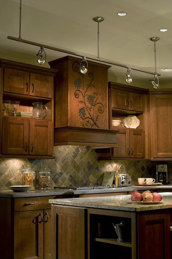 Inspiration for a mid-sized rustic kitchen remodel in New York with shaker cabinets, dark wood cabinets, granite countertops, multicolored backsplash, stone tile backsplash and an island