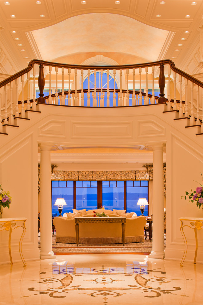 Huge elegant marble floor foyer photo in Portland Maine