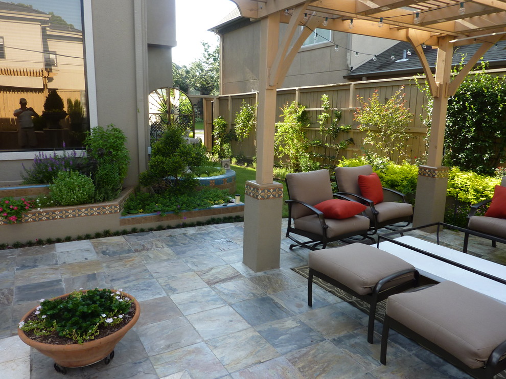 This is an example of a mediterranean patio in Houston.