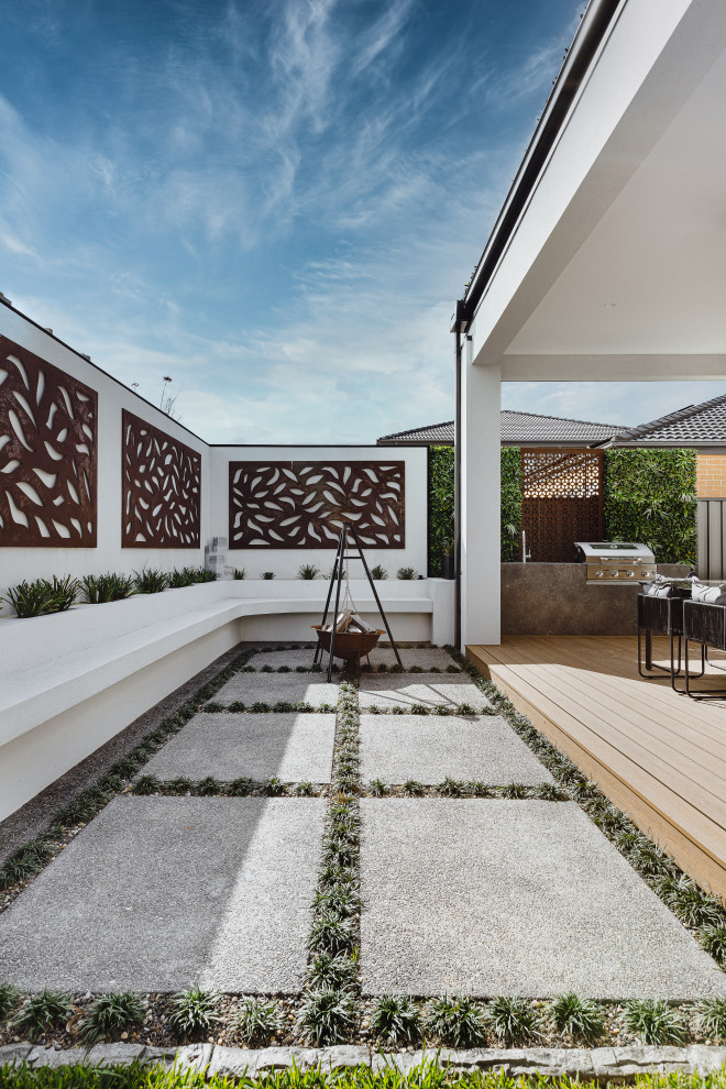 Photo of a contemporary patio in Melbourne with a bbq area.