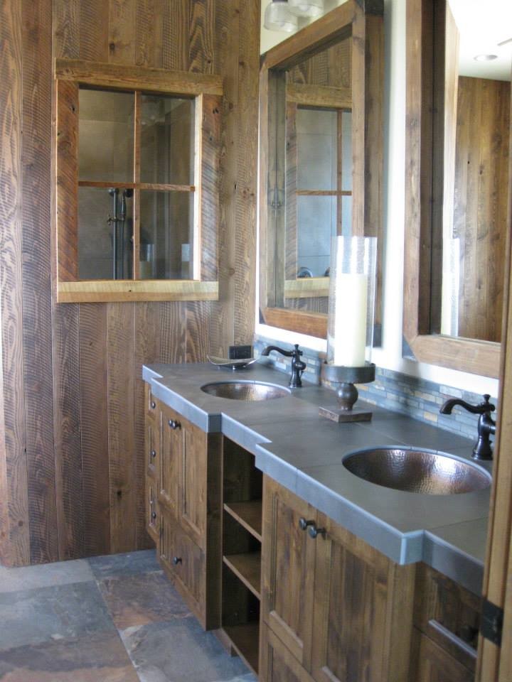 Bathroom - small rustic 3/4 slate floor bathroom idea with medium tone wood cabinets