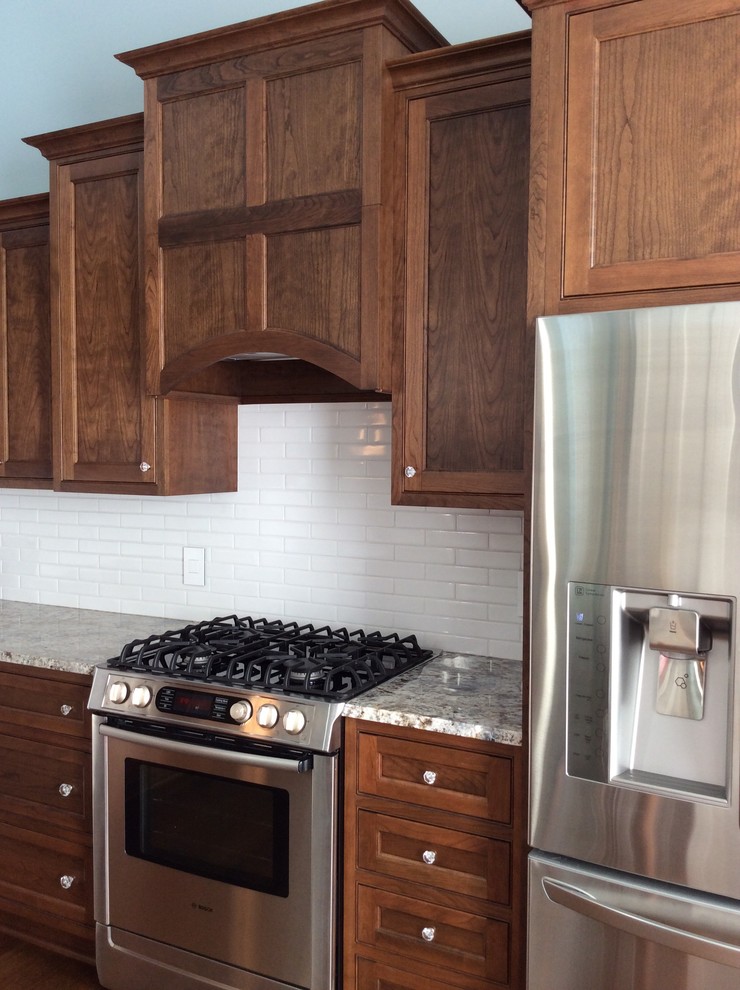Example of a transitional kitchen design in Cleveland