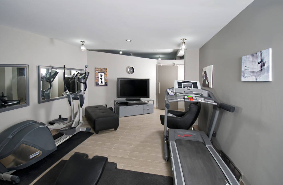 Photo of a mid-sized contemporary home weight room in Other with grey walls and ceramic floors.
