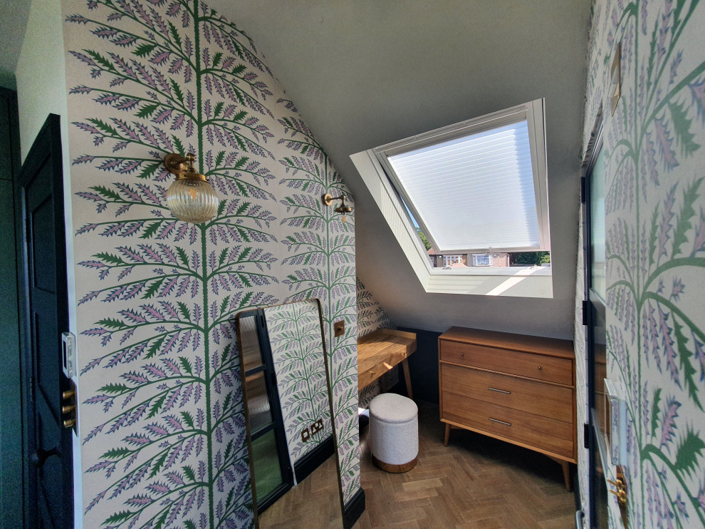 Loft fit outStorage nook with wallpaper and skylight