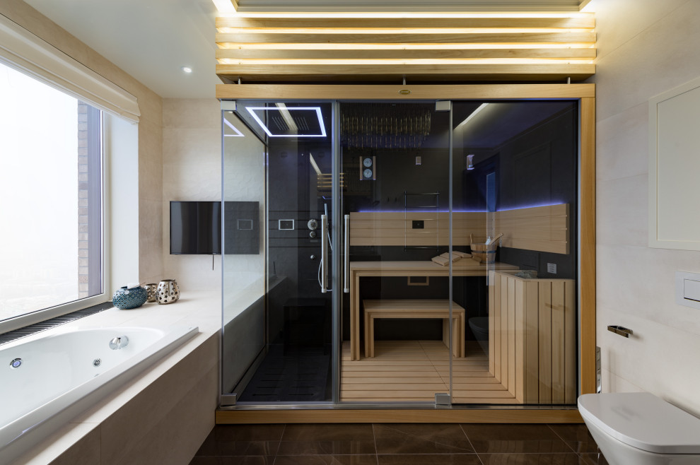 Стильный дизайн: ванная комната в стиле неоклассика (современная классика) с накладной ванной, душем в нише, инсталляцией, бежевой плиткой, коричневым полом и душем с распашными дверями - последний тренд