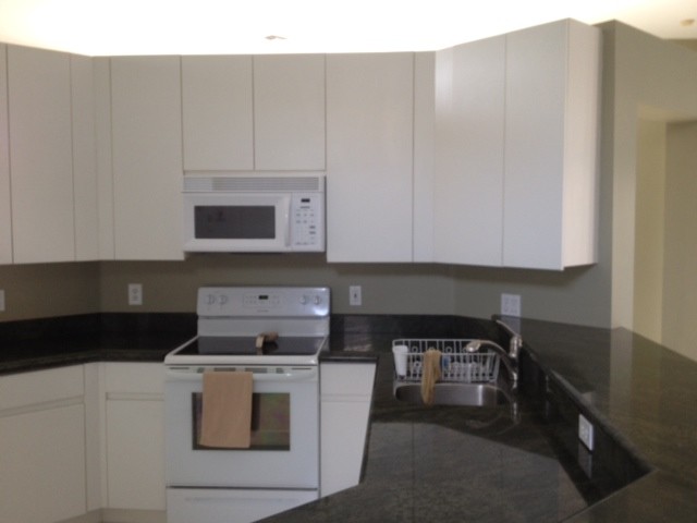Paula and Frank's Kitchen Reface White Thermofoil with Wood Grain