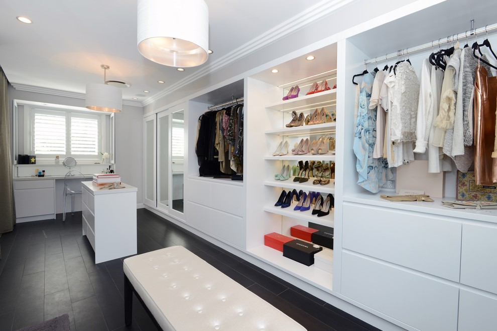 Photo of a contemporary storage and wardrobe in Sydney.