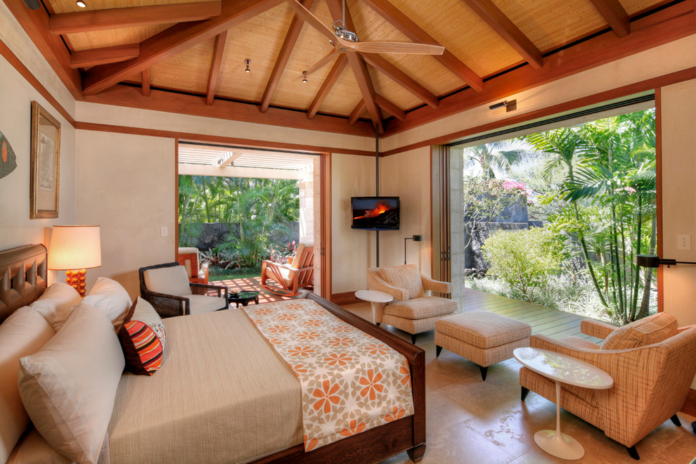 Tropical bedroom in Hawaii with beige walls and no fireplace.