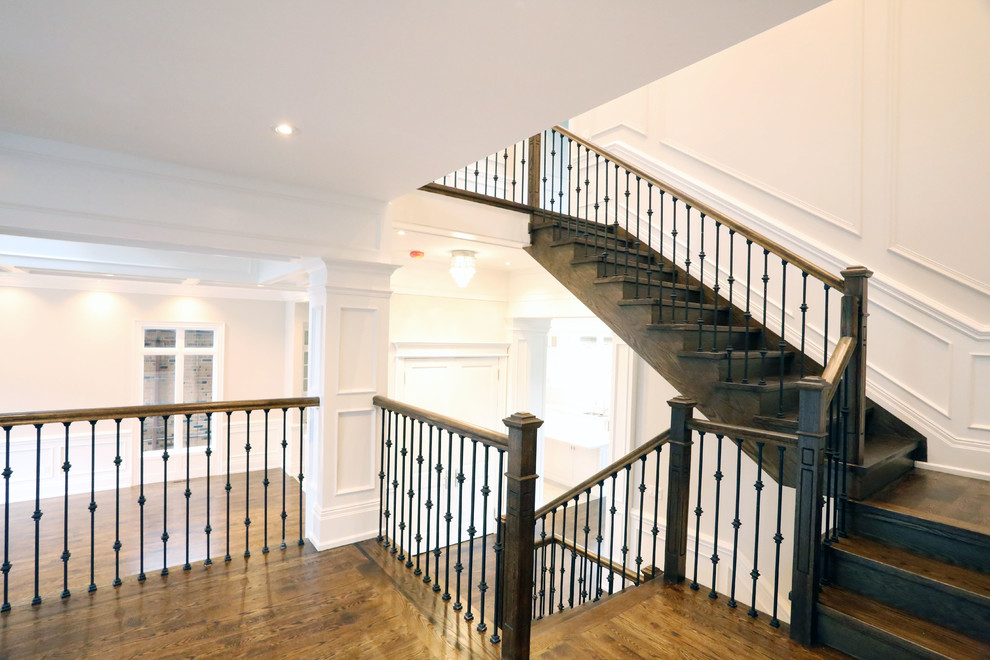 Example of a transitional home design design in Toronto