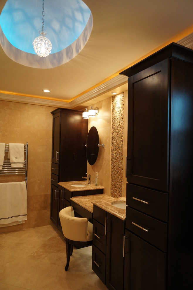 Design ideas for a mid-sized transitional master bathroom in Philadelphia with flat-panel cabinets, dark wood cabinets, a two-piece toilet, beige tile, stone tile, an undermount sink, granite benchtops, an alcove shower and travertine floors.