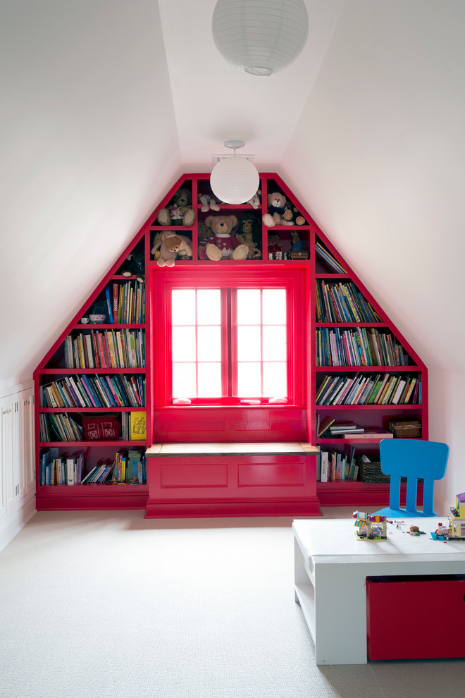 Kids Playroom - Stacy Bass

Second floor hideaway for children's books and toys. Game area. Study area. Seating area. Red color calls attention to custom built-in bookshelves and storage space. Reading nook beneath sunny window invites readers of all ages.