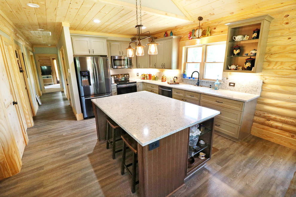 Eat-in kitchen - large rustic u-shaped dark wood floor and brown floor eat-in kitchen idea in Houston with an undermount sink, recessed-panel cabinets, gray cabinets, quartz countertops, white backsplash, stone slab backsplash, stainless steel appliances, an island and white countertops