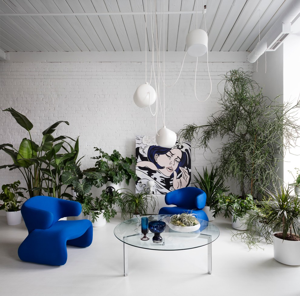 Example of an eclectic open concept white floor living room design in Toronto with white walls and no tv