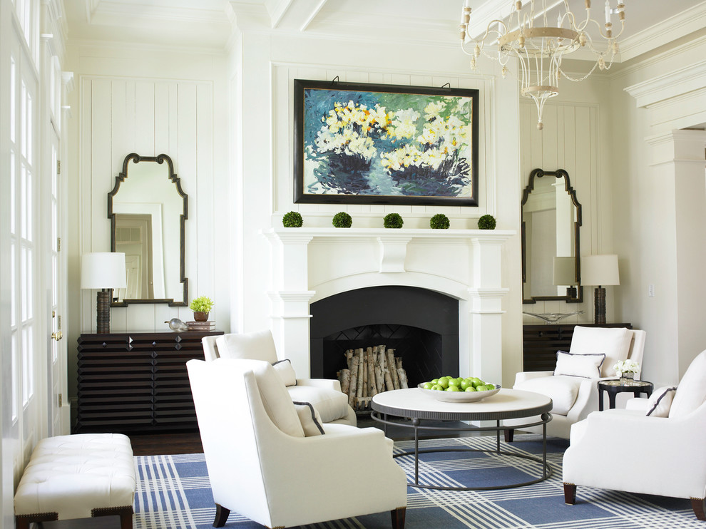 Inspiration for a traditional living room in Atlanta with white walls, a standard fireplace and no tv.