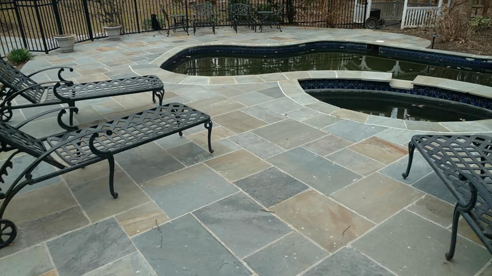 Pool - huge transitional backyard stone and kidney-shaped natural pool idea