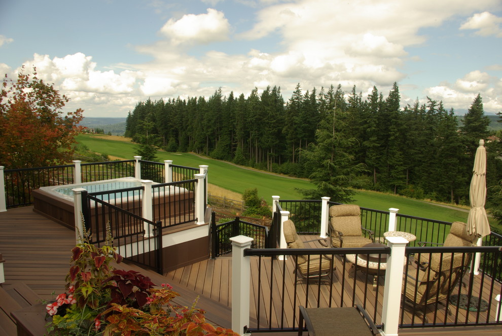 Transitional backyard balcony deck photo in Seattle with no cover