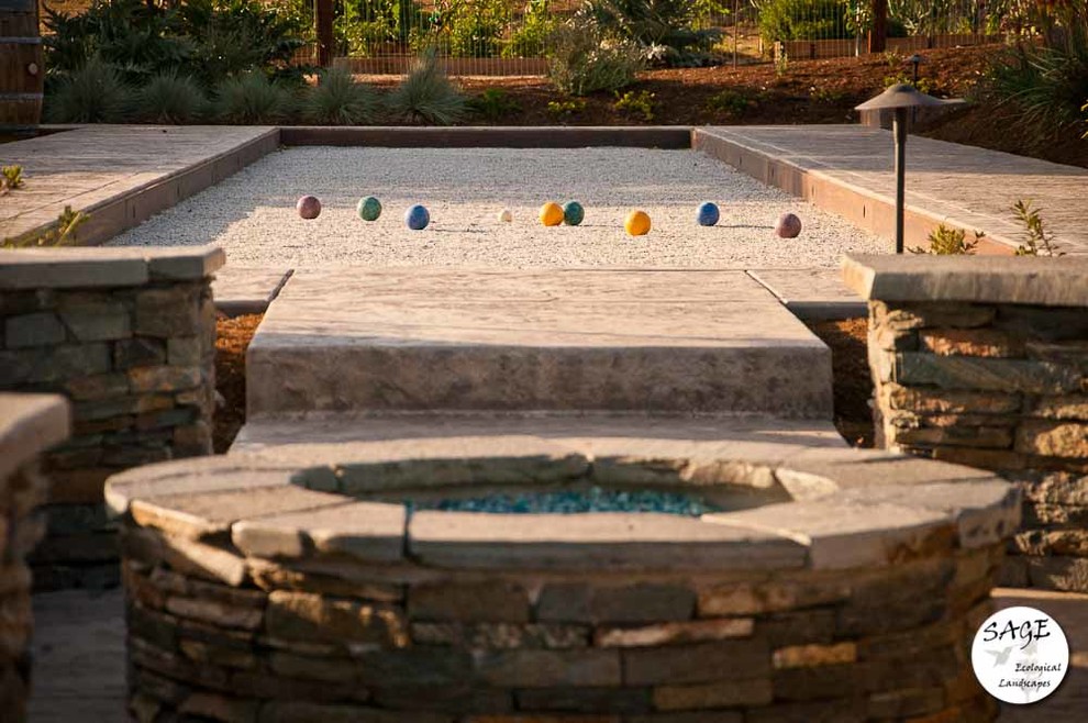 Design ideas for a large mediterranean backyard full sun outdoor sport court in San Luis Obispo with concrete pavers.