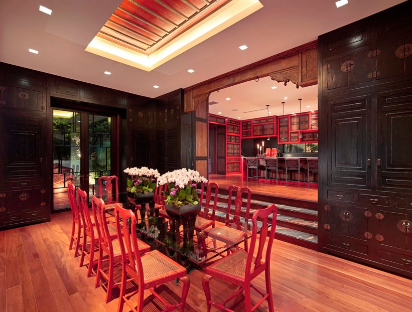 Inspiration for an expansive asian open plan dining in Miami with white walls and medium hardwood floors.