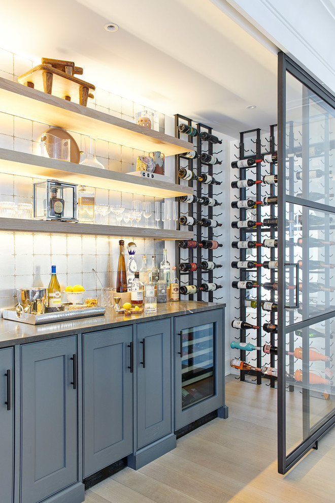 Example of a transitional wine cellar design in New York