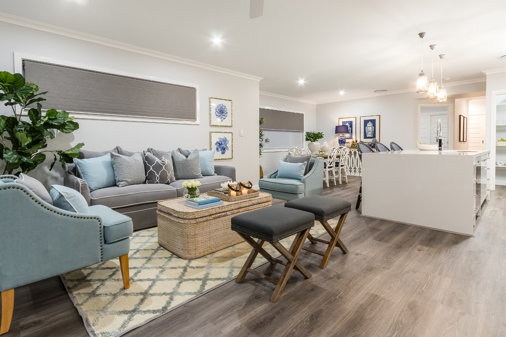 This is an example of a mid-sized beach style formal open concept living room in Brisbane with grey walls and dark hardwood floors.