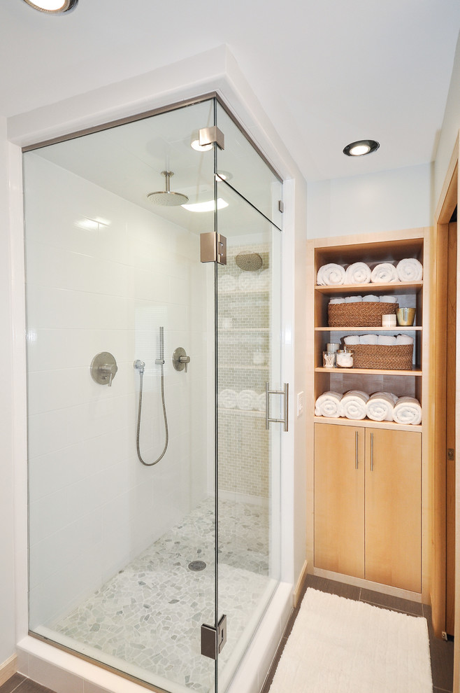 Inspiration for a small contemporary master bathroom in Minneapolis with a vessel sink, flat-panel cabinets, light wood cabinets, wood benchtops, a double shower, green tile, pebble tile, grey walls and ceramic floors.