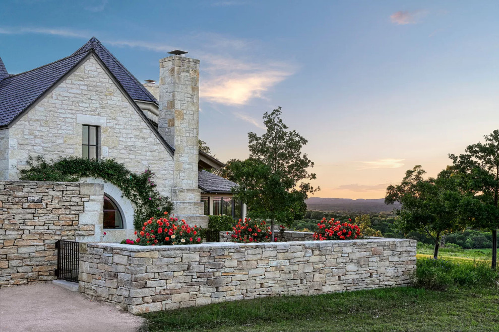Design ideas for a white rural house exterior in Austin with a shingle roof and a grey roof.