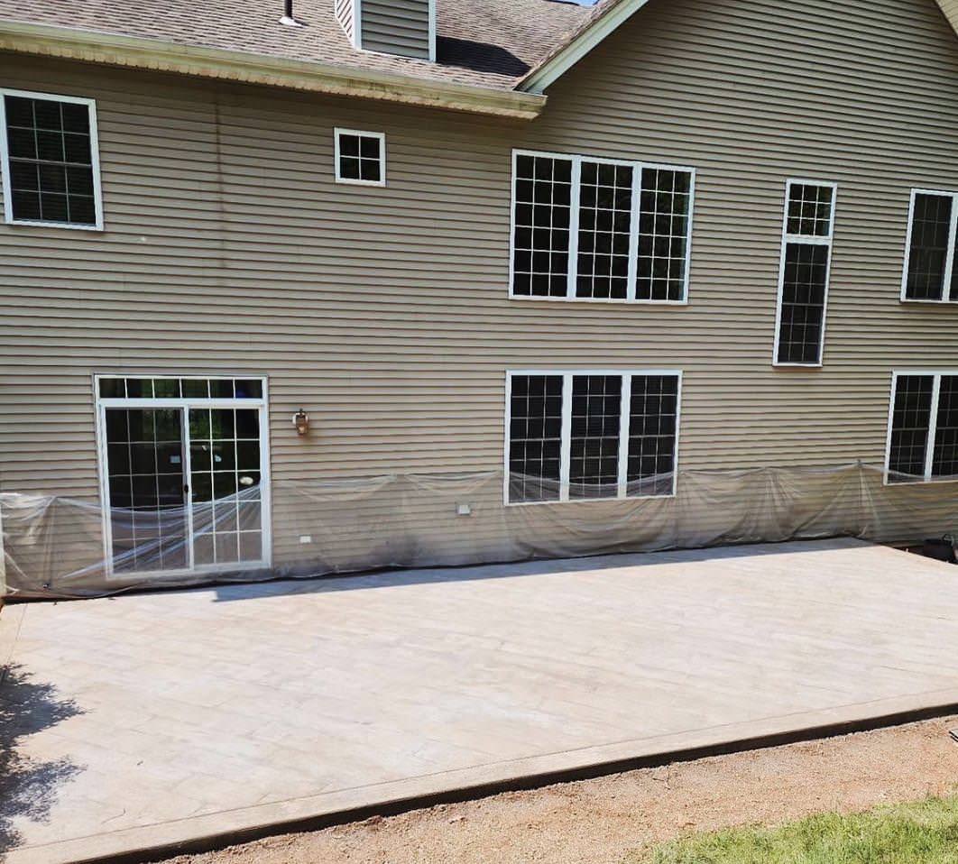 Turtle creek backyard Stamped Concrete patio!