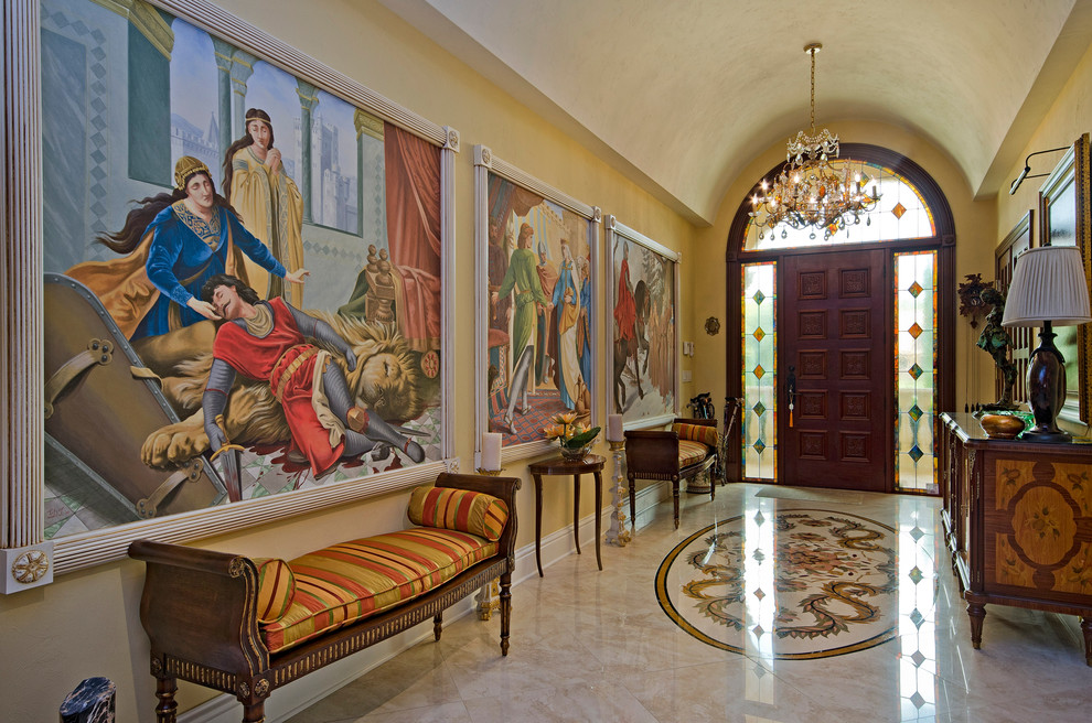 Inspiration for a traditional entry hall in Miami with yellow walls.