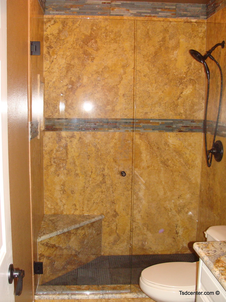 Mid-sized stone slab doorless shower photo