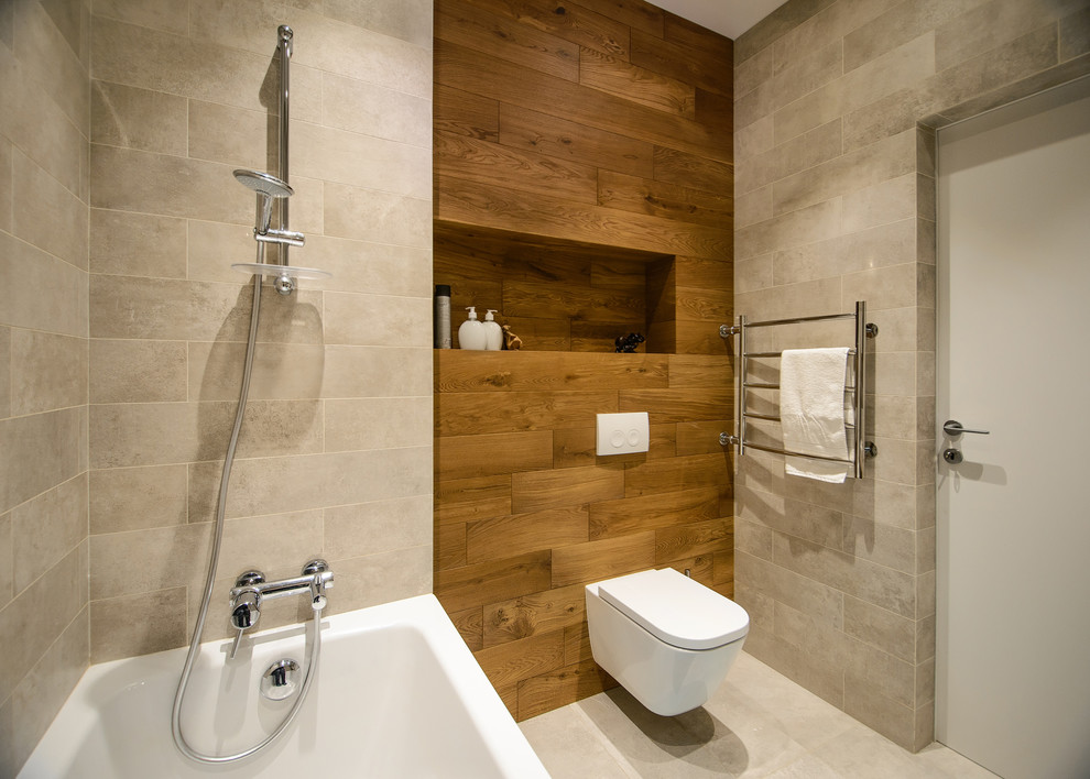 Design ideas for a contemporary master bathroom in Novosibirsk with an alcove tub, a wall-mount toilet, brown tile, gray tile, porcelain tile, porcelain floors and an open shower.