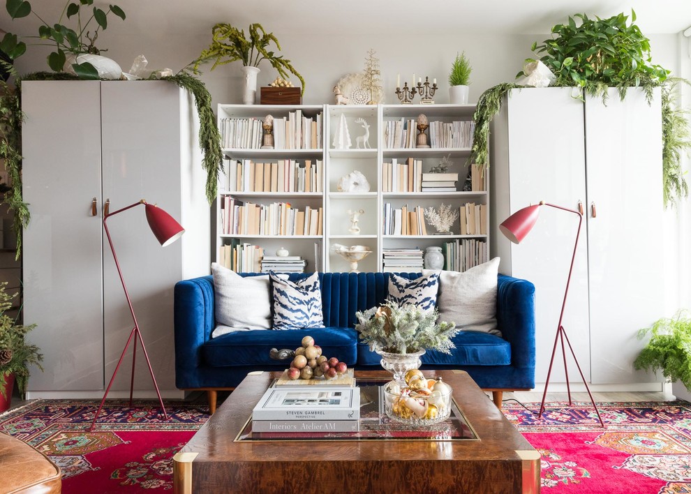Example of an eclectic living room design in Chicago with white walls