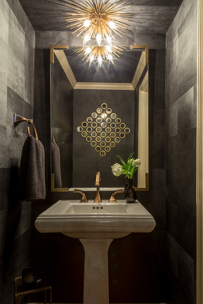 Design ideas for a small modern powder room in San Francisco with furniture-like cabinets, a one-piece toilet, grey walls, light hardwood floors, a pedestal sink and brown floor.
