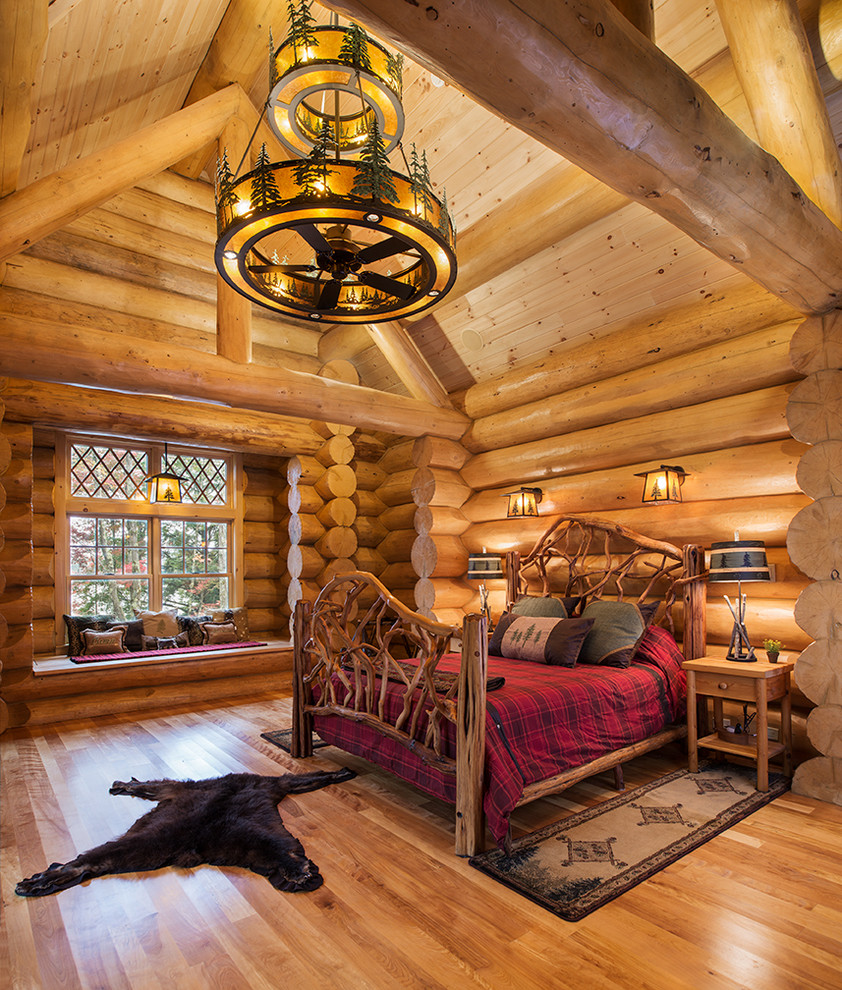 Design ideas for a country master bedroom in New York with yellow walls, medium hardwood floors and yellow floor.