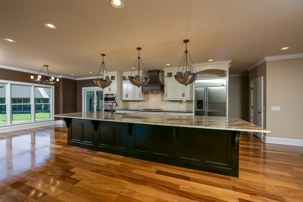 Photo of an arts and crafts kitchen in Other with granite benchtops and with island.