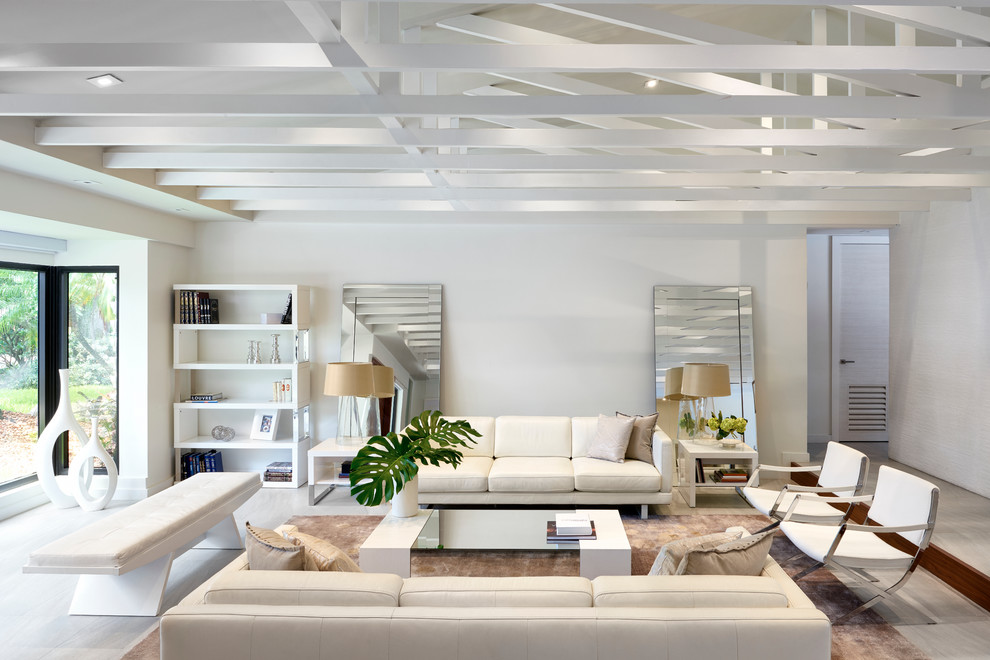 Contemporary formal living room in Miami with white walls and ceramic floors.