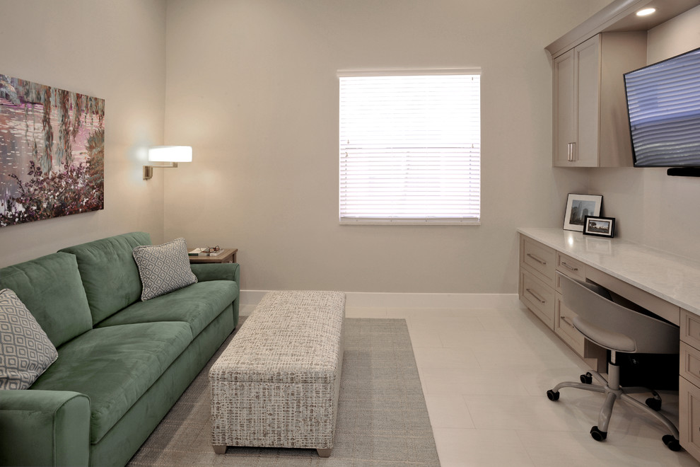 This is an example of a transitional study room in Miami with grey walls, porcelain floors, a built-in desk and white floor.