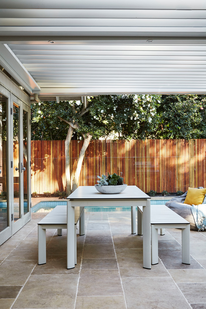 This is an example of a mid-sized contemporary patio in Sydney.