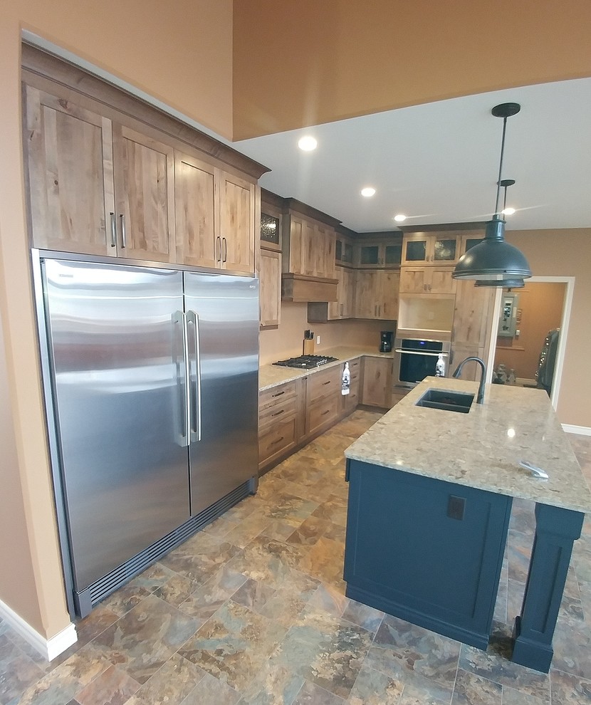 Example of a mountain style kitchen design in Toronto