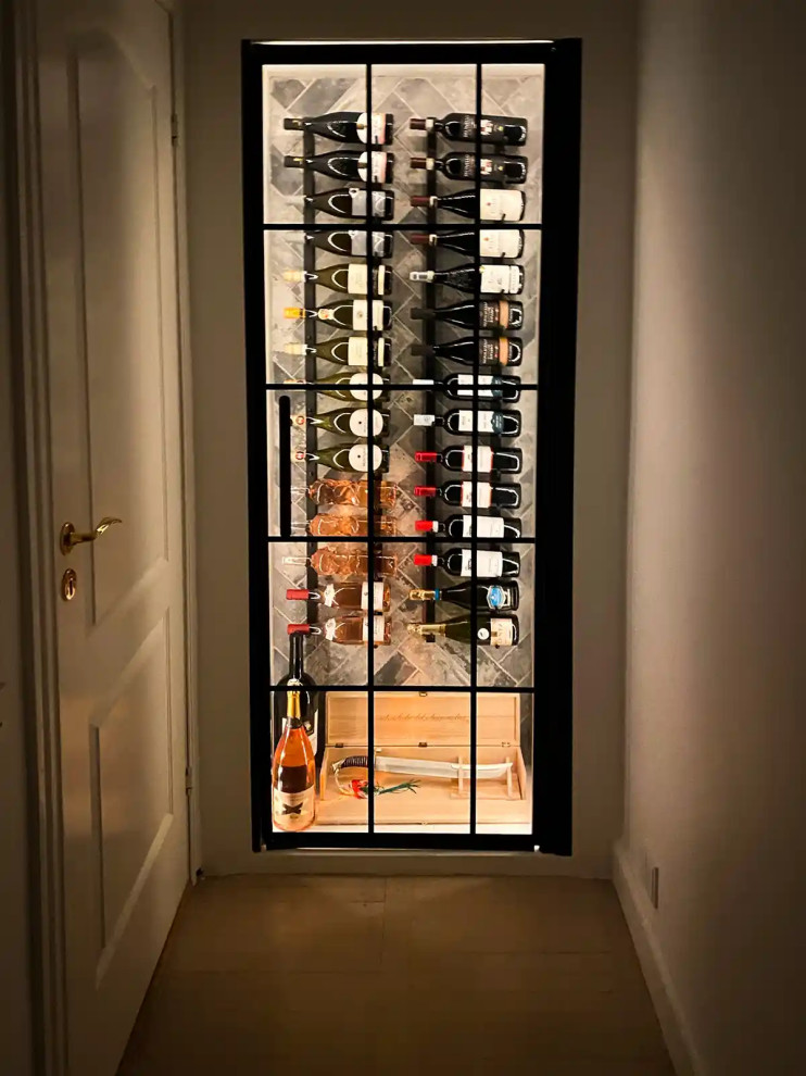 Design ideas for a small scandinavian wine cellar with display racks.