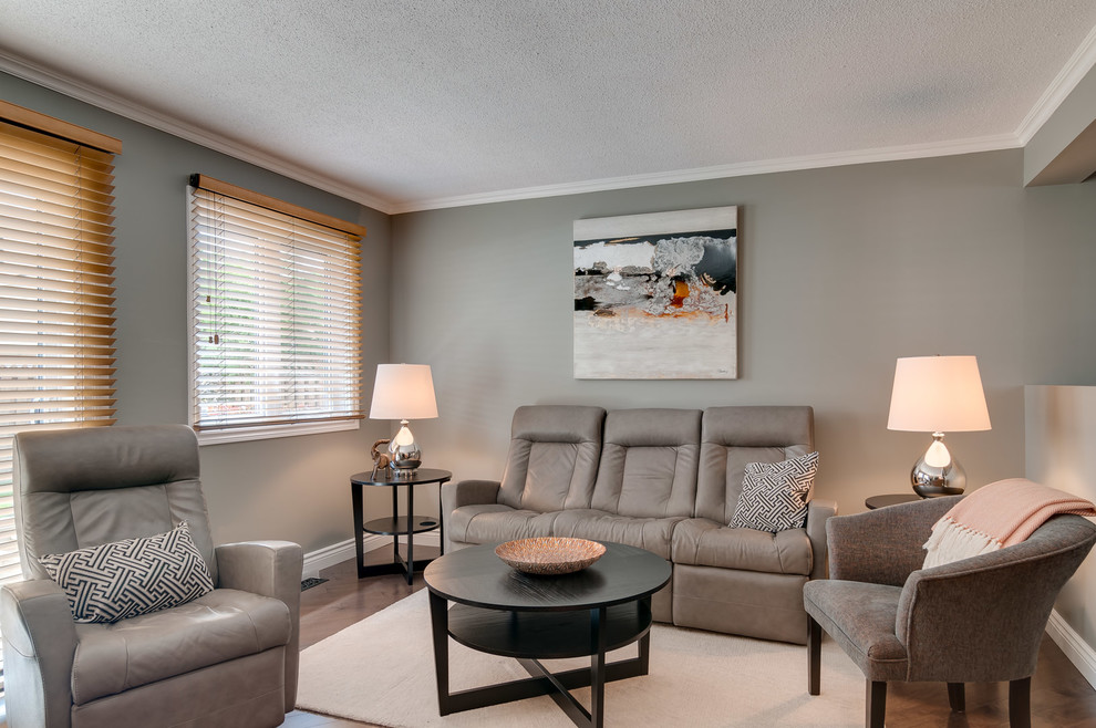 This is an example of a contemporary family room in Ottawa.