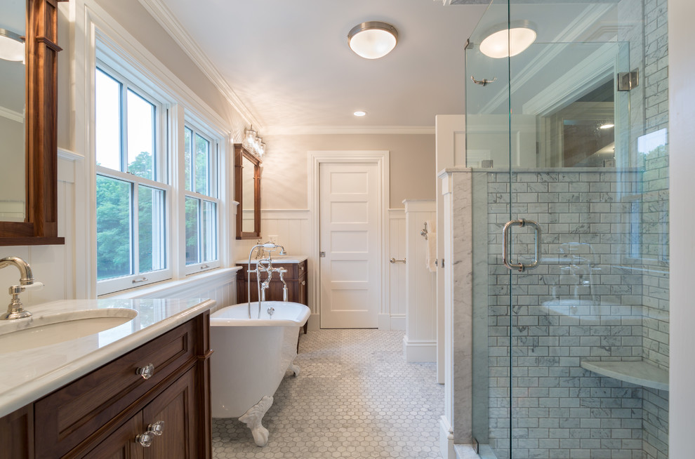 Design ideas for a country bathroom in Providence with an undermount sink, recessed-panel cabinets, dark wood cabinets, a claw-foot tub, gray tile, grey floor, a corner shower and a hinged shower door.