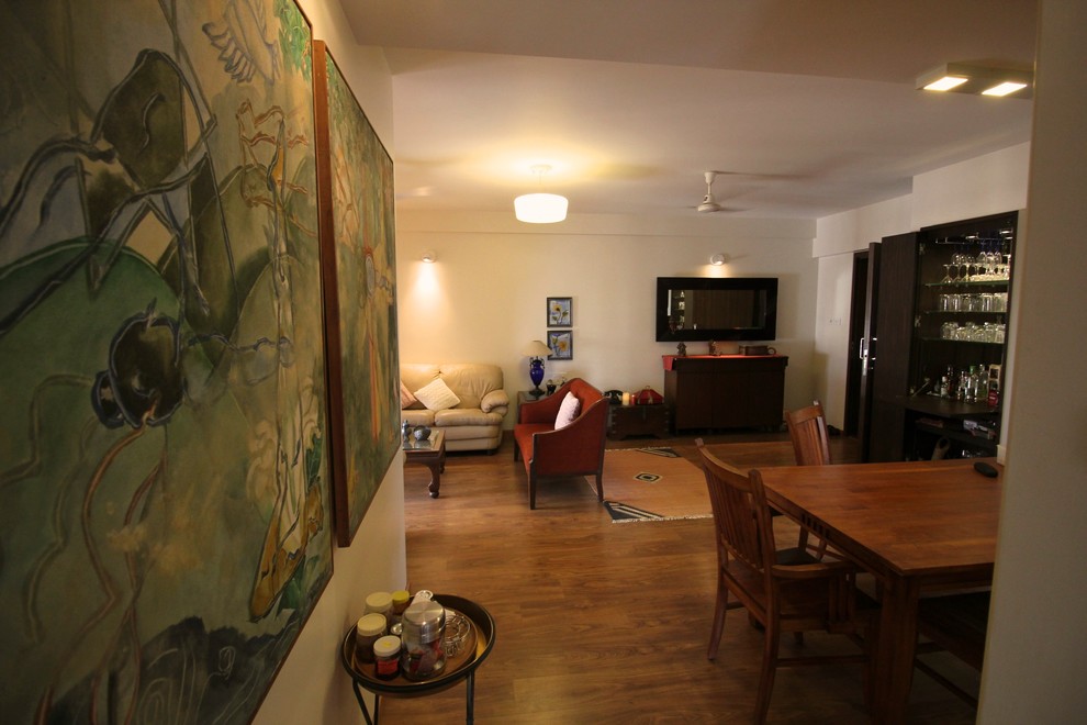 Transitional dining room in Pune.