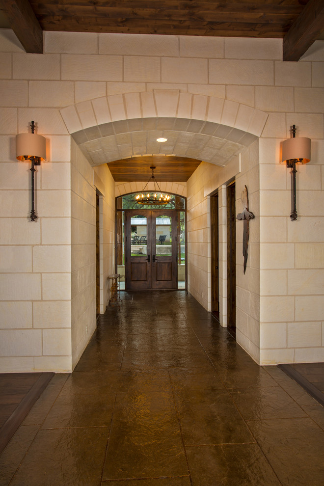 Inspiration for a rustic entryway remodel in Austin