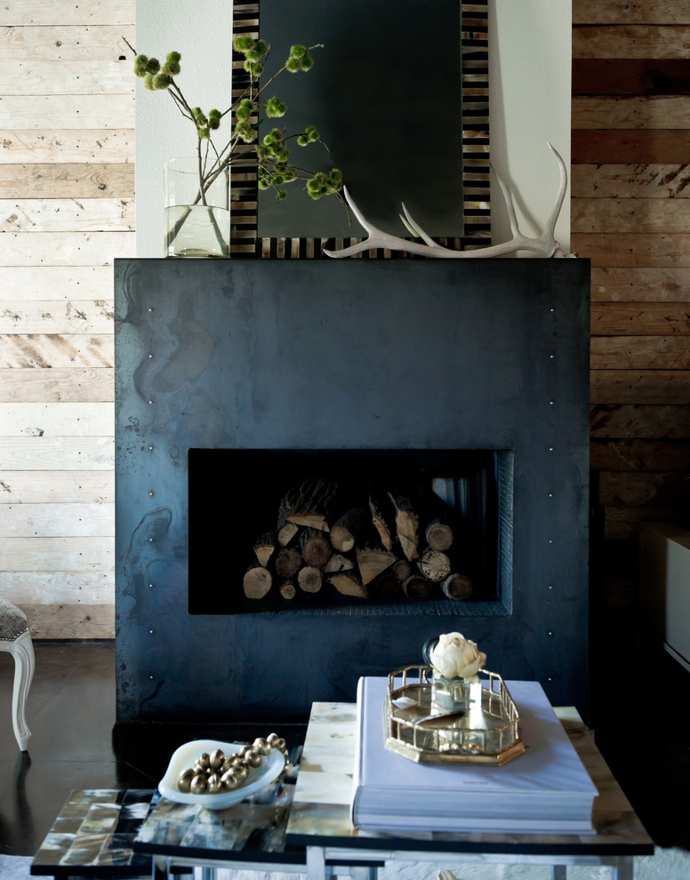 Inspiration for an eclectic living room in Dallas with a standard fireplace.