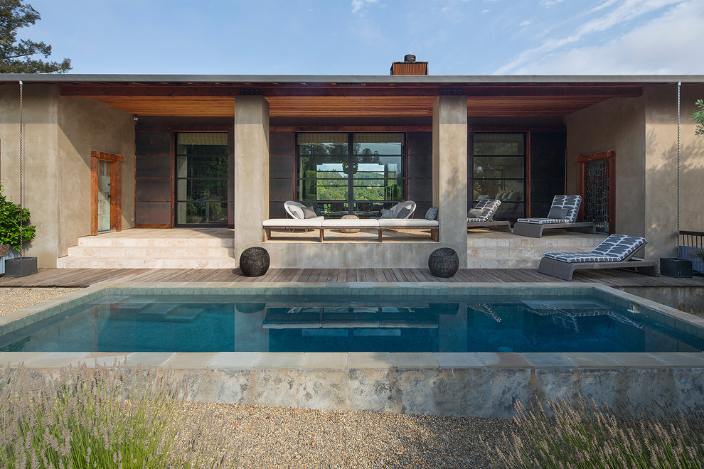Inspiration for a large country side yard rectangular pool in San Francisco with a pool house.