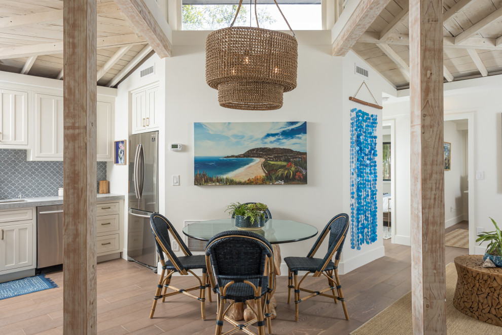 Inspiration for a coastal dining room remodel in Orange County