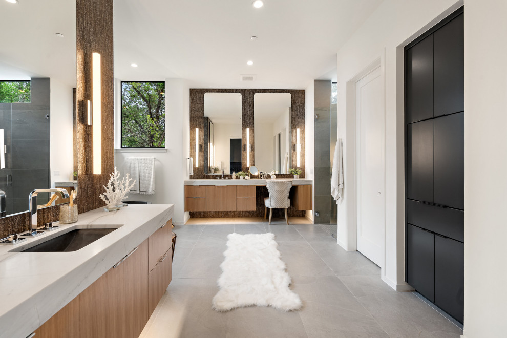 Inspiration for a mid-sized contemporary master single-sink wet room remodel in Austin with flat-panel cabinets, gray cabinets, a one-piece toilet, white walls, an undermount sink, quartz countertops, a hinged shower door, white countertops and a built-in vanity