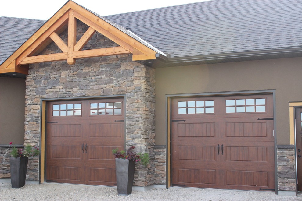 Example of a mountain style home design design in Calgary